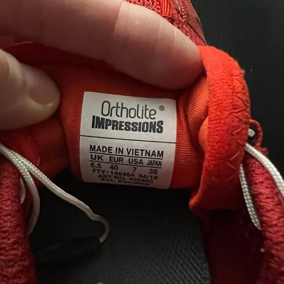 Salomon like new size 9 women size 7 men, red hiking sneakers. - Picture 3 of 8